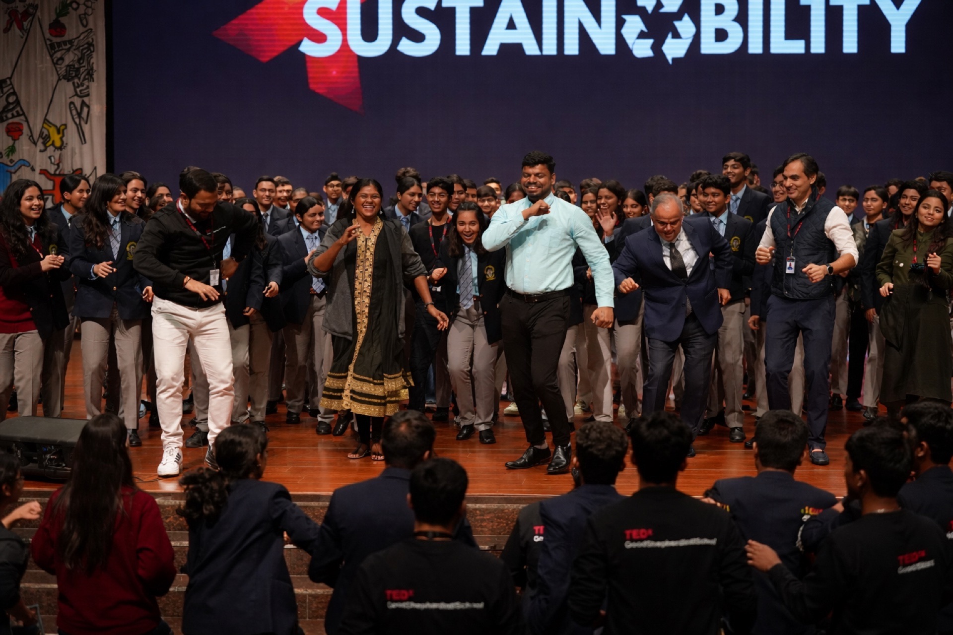 Jothi on the TEDx stage